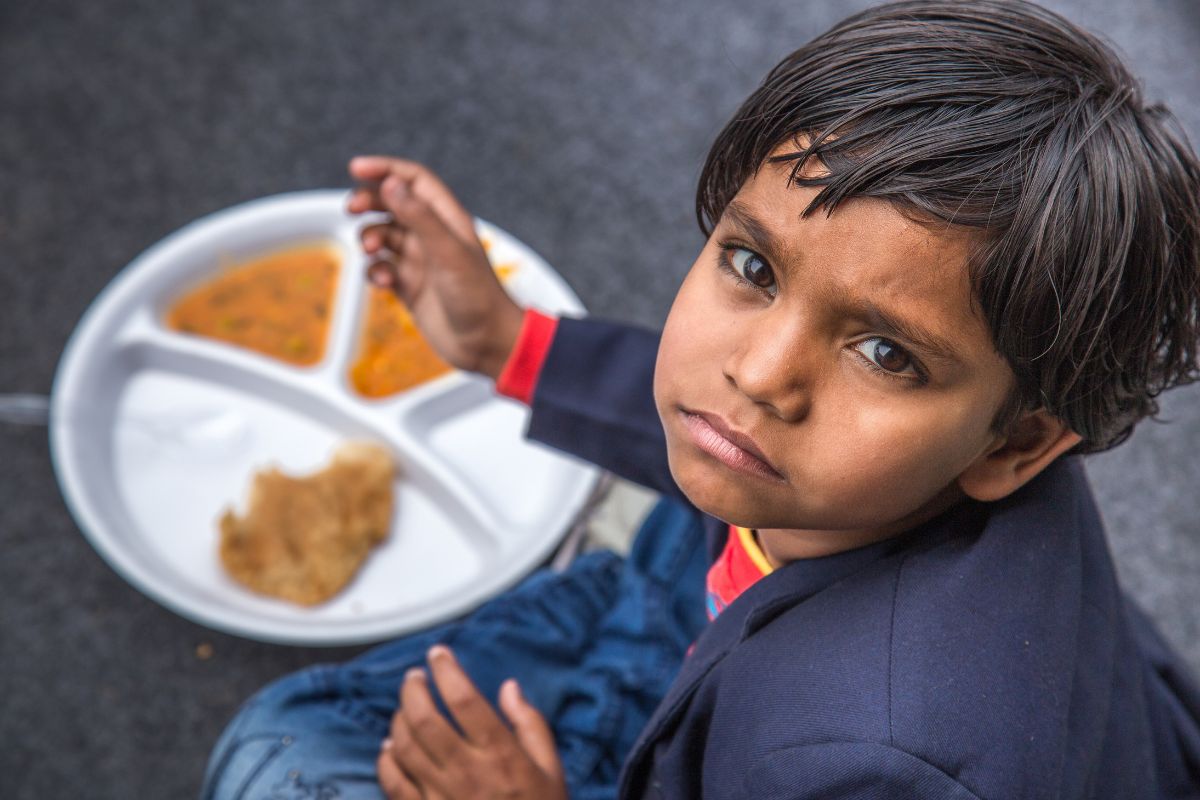 Hungry boy stock people